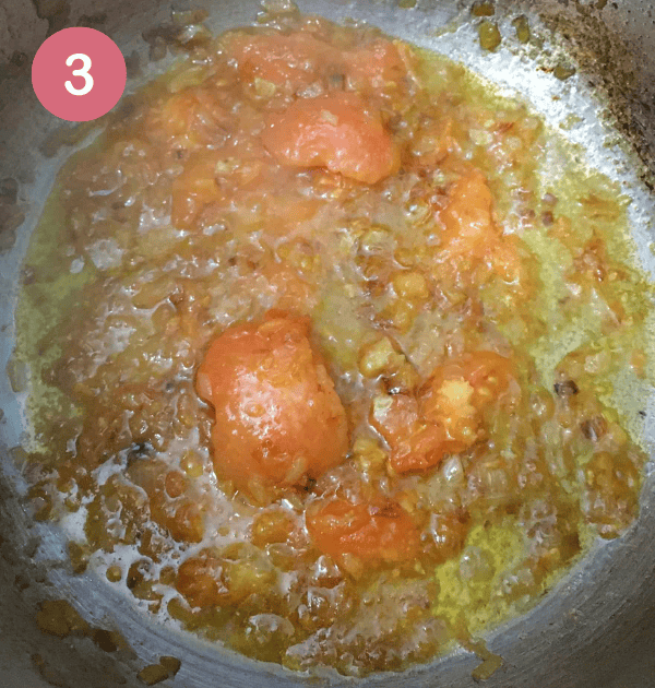 Step 3: Add the ginger, garlic and spices, turn the heat to high and stir, to allow the mixture to break down and become a thick paste