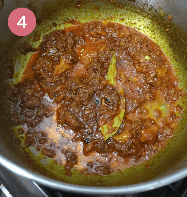 Step 4: Once the paste is very dark, glossy and the oil has separated, it's ready [Pakistani Chicken Curry Recipe]